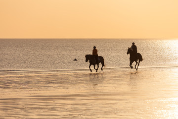 Reiter am Strand