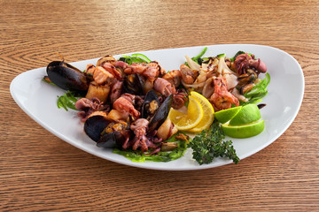 shrimp and Octopus on a white plate