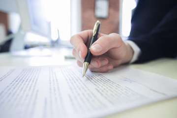 Businessman signing a contract