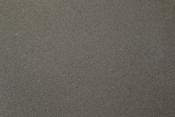 Black sand volcanic beach background in Tenerife