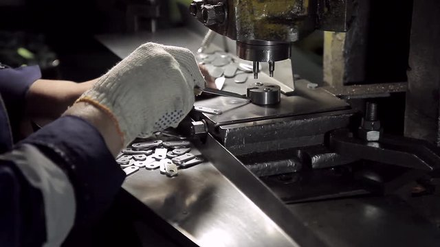 Hard work in factory of hardware