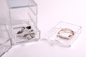 Box for jewelry on a white background. earrings, bracelets, pendants.