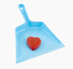 Dustpan with Valentine heartbreak concept. Isolated.
