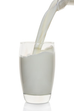 Milk is poured into a glass