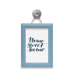 Home sweet home - motivational quote. Stylized lettering. Blue wooden frame