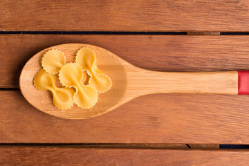 Farfalle into a spoon