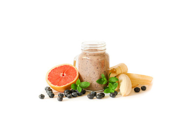 Blueberry smoothie with banana, grapefruit, lemon and mint leaves.