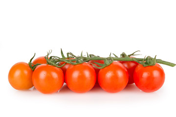 ripe cherry tomatoes on a white background