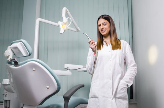 Portrait of young female dentist 