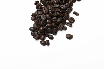 Abstract background of many coffee beans on white background. Drink. Vertical shoot.