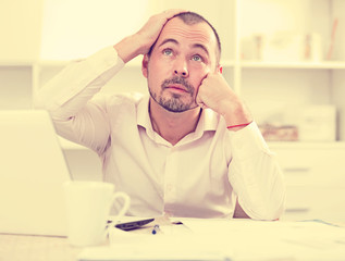 Naklejka premium Disappointed worker feeling stressed