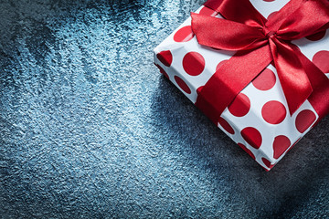 Red gift box on black background celebrations concept