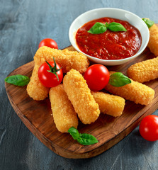 Breaded mozzarella cheese sticks with tomato basil sauce