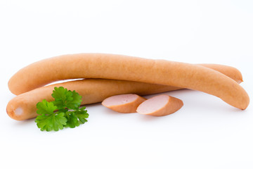 Wiener sausages on the white background.