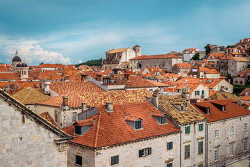 Fototapeta na wymiar Rooftops in Dubrovnik old town in Croatia on a sunny day with blue sky