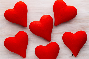Red hearts the gray background. Valentine Day background.
