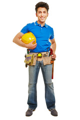Handwerker mit Helm und Werkzeug