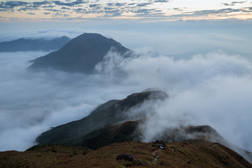 Cloudy view from the Lantau Peak (the second highest peak in Hong Kong, China (934m)) at dawn.