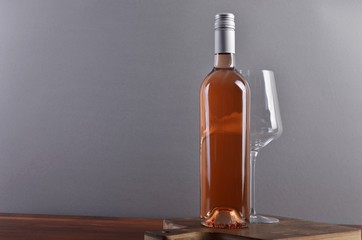 Rose wine on board with glass