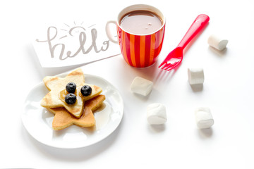 concept kid breakfast with pancake on white background