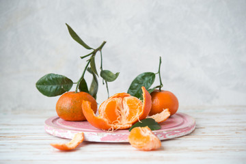 Fresh tangerines with leaves
