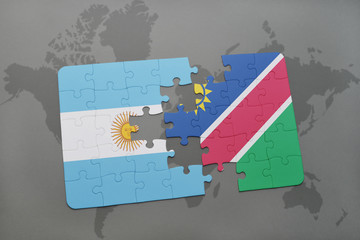 puzzle with the national flag of argentina and namibia on a world map