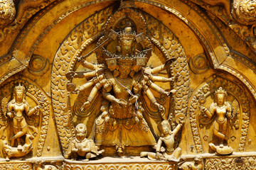 Fototapeta na wymiar Tympanum of the Golden gate on Durbar square in Bhaktapur, Nepal