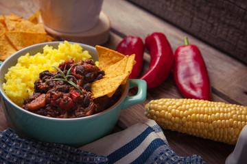 Homemade chilli con carne with beans, pepper and rice