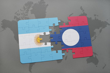 puzzle with the national flag of argentina and laos on a world map