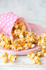 Sweet caramel popcorn in a bag
