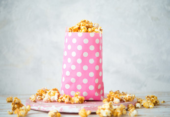 Sweet caramel popcorn in a bag
