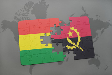 puzzle with the national flag of bolivia and angola on a world map