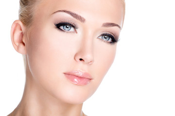 Fototapeta premium portrait of beautiful white woman with long false eyelashes