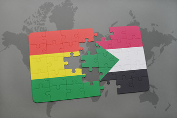 puzzle with the national flag of bolivia and sudan on a world map