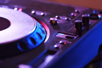 Fototapeta na wymiar Dj mixer in nightclub, closeup
