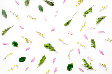 Fototapeta premium Froral pattern on white table background top view mockup