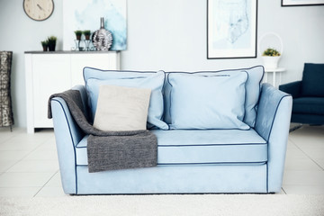 Sofa in modern room interior