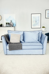 Sofa in modern room interior
