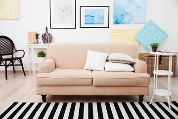 Sofa in modern room interior