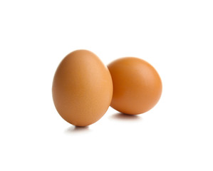 Raw eggs on white background