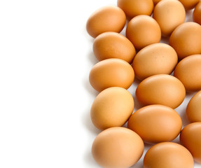 Raw eggs on white background