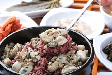 dolsot gul bap. Rice with Oysters in a Hot Pot