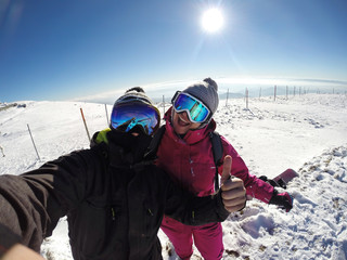 Fototapeta na wymiar Enjoyment on skiing in snowy mountain