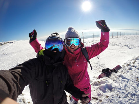 Cheerful couple on skiing