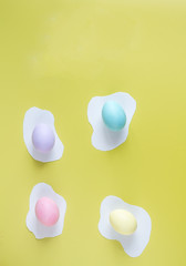 Easter concept on yellow background top view mockup