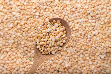 yellow peas in a spoon