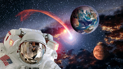 Astronaut planet Earth Mars spaceman shooting star helmet space suit galaxy universe. Elements of this image furnished by NASA.