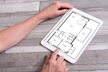Apartment plan concept on a tablet