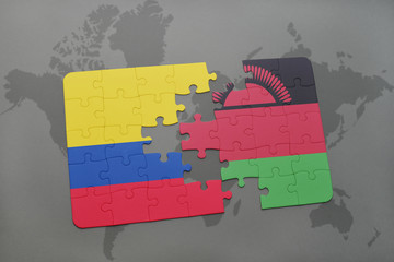 puzzle with the national flag of colombia and malawi on a world map