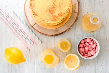 cooking lemon cake top view on wooden background